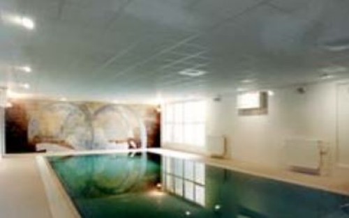 KONDENZACE VODNÍ PÁRY V LEHKÉ DVOUPLÁŠŤOVÉ STŘEŠE NAD BAZÉNEM